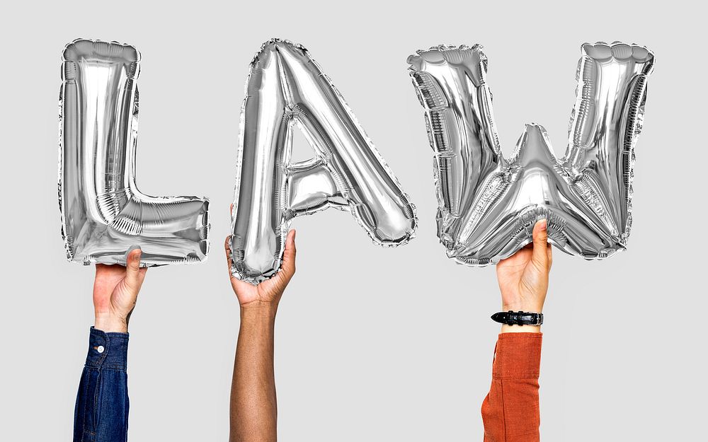 Gray balloon letters forming the word law