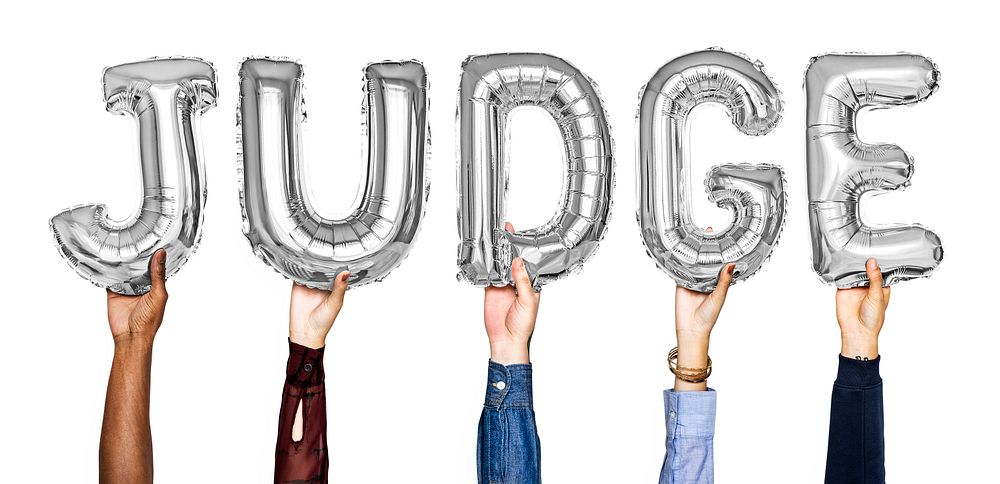 Gray balloon letters forming the word judge