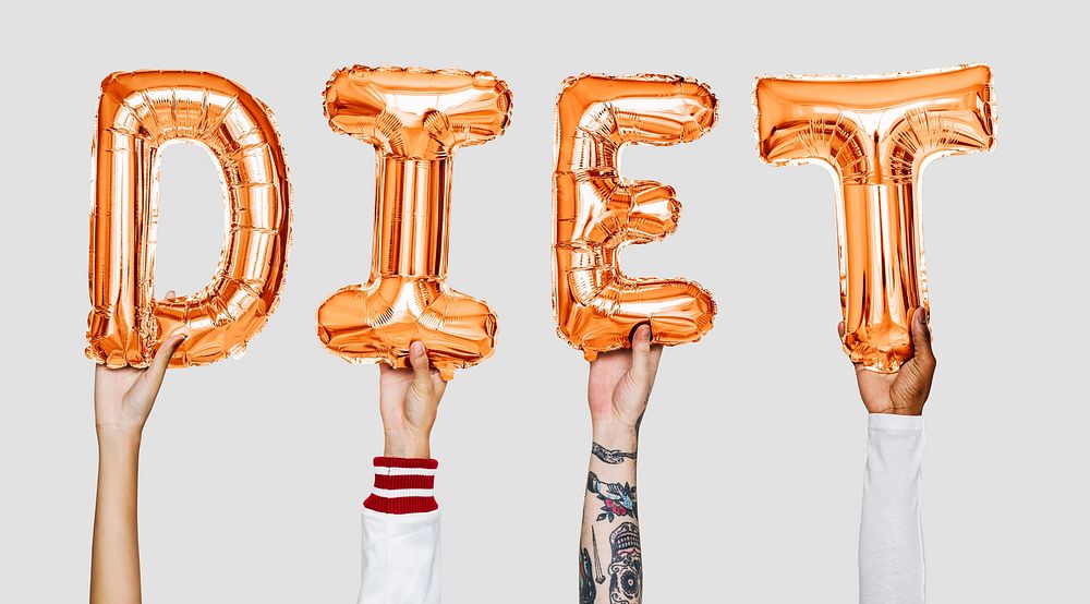 Hands showing diet balloons word