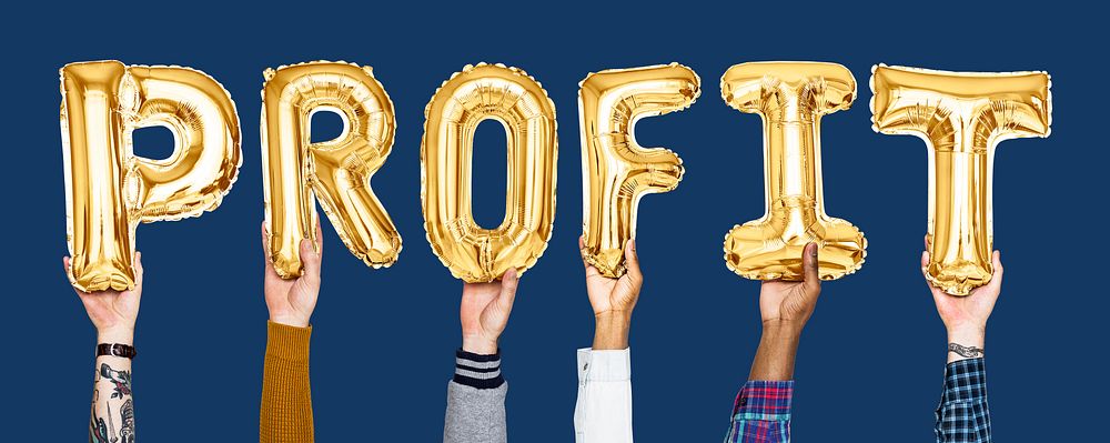 Golden balloon letters forming the word profit