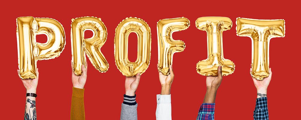 Golden balloon letters forming the word profit
