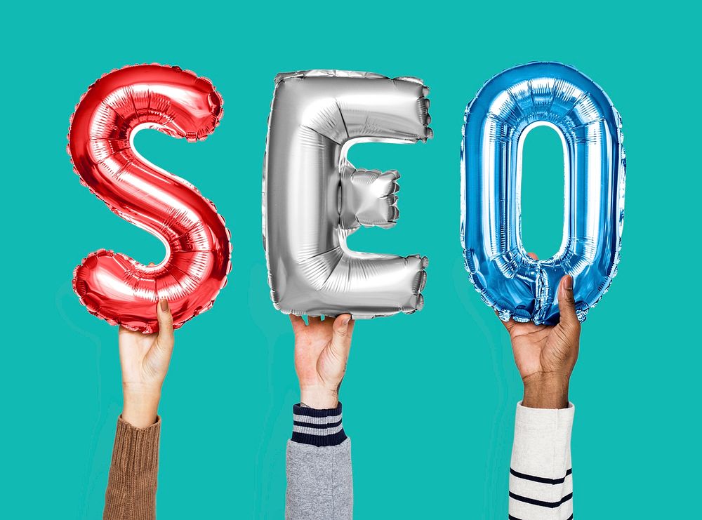 Colorful balloon letters forming the word SEO