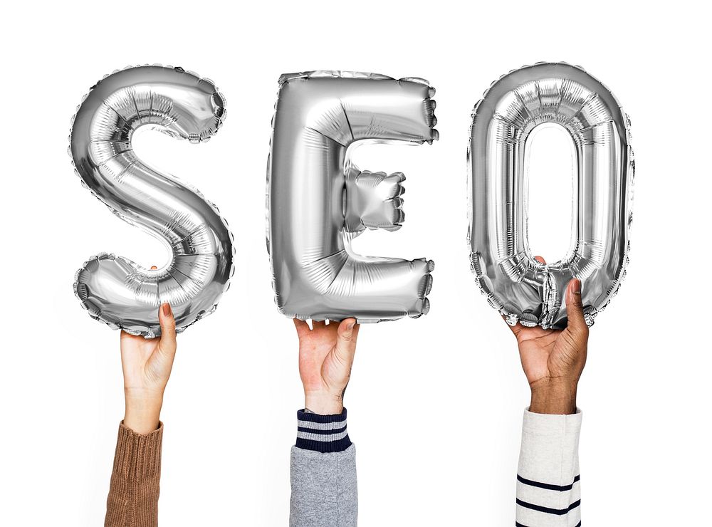Gray balloon letters forming the word SEO