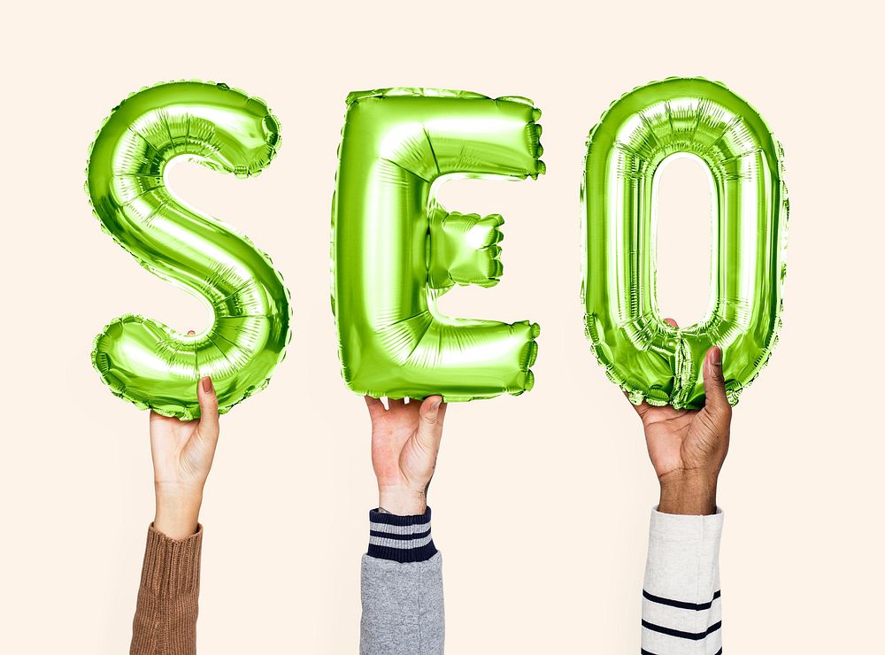 Green balloon letters forming the word SEO