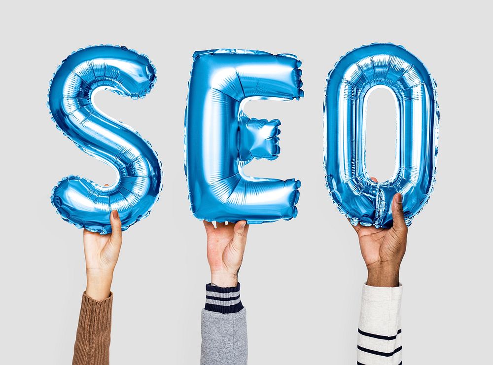 Blue balloon letters forming the word SEO
