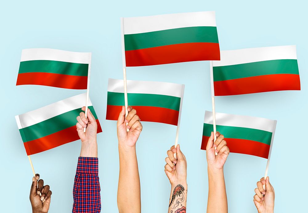 Hands waving flags of Bulgaria
