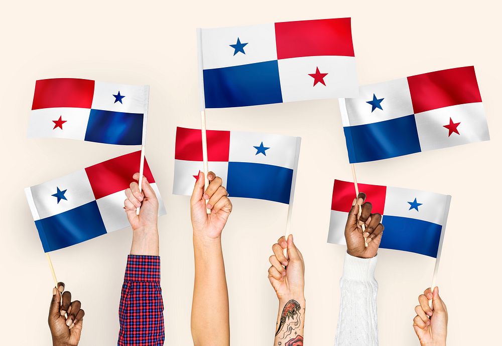 Hands waving the flags of Panama