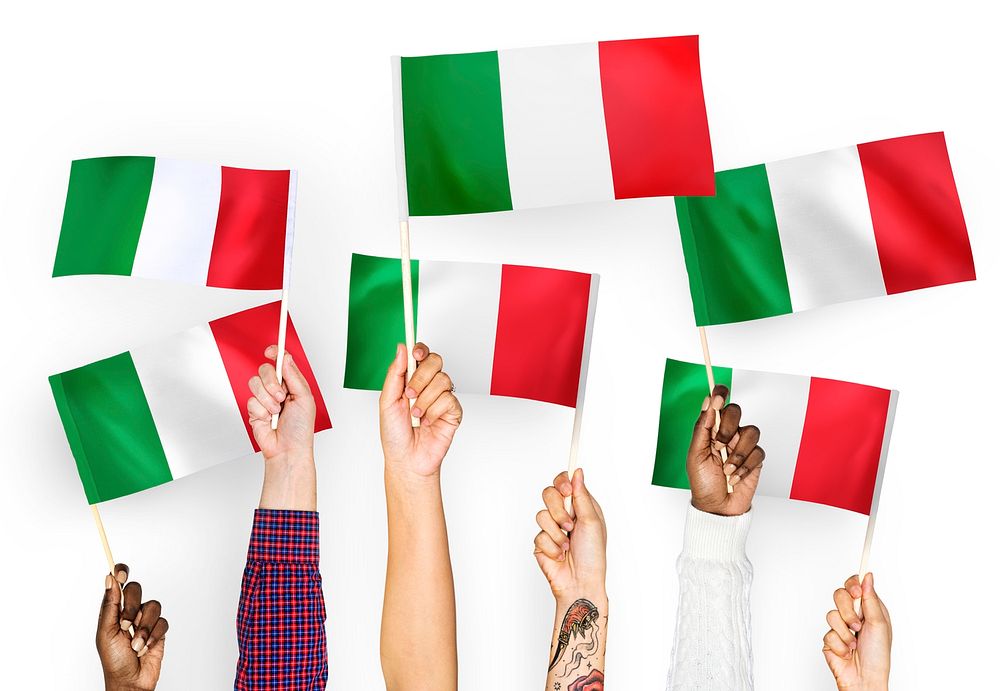 Hands waving flags of Italy