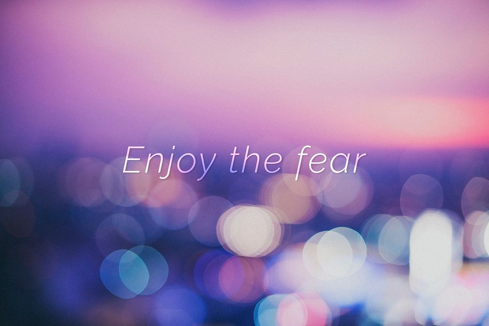 Enjoy the fear quote on a bokeh background