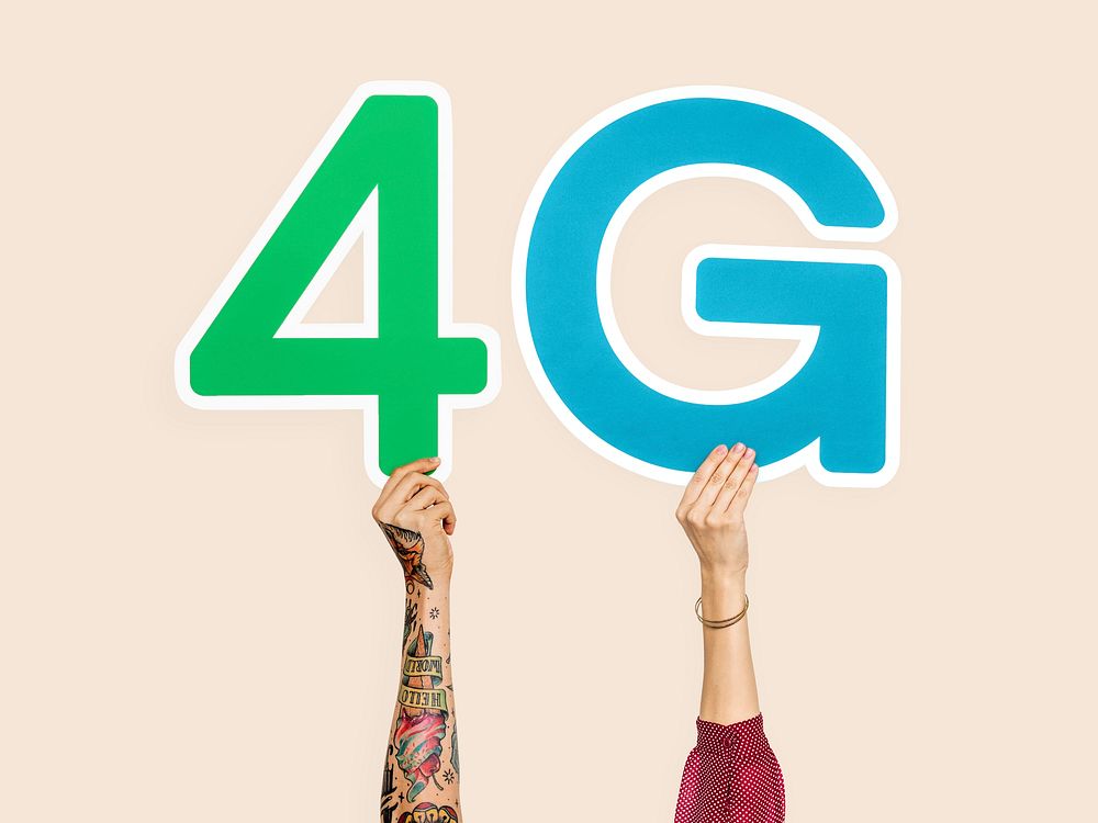 Hands holding up colorful letters forming the abbreviation 4G