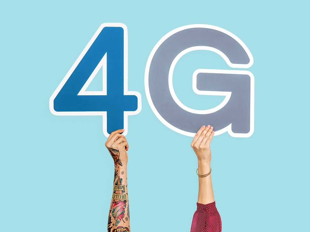 Hands holding up colorful letters forming the abbreviation 4G