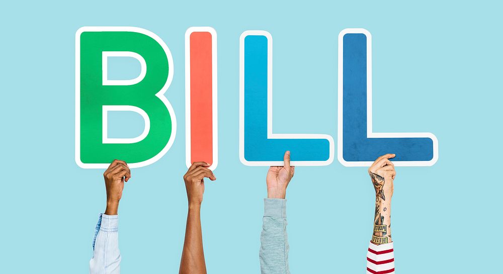 Hands holding up colorful letters forming the word bill