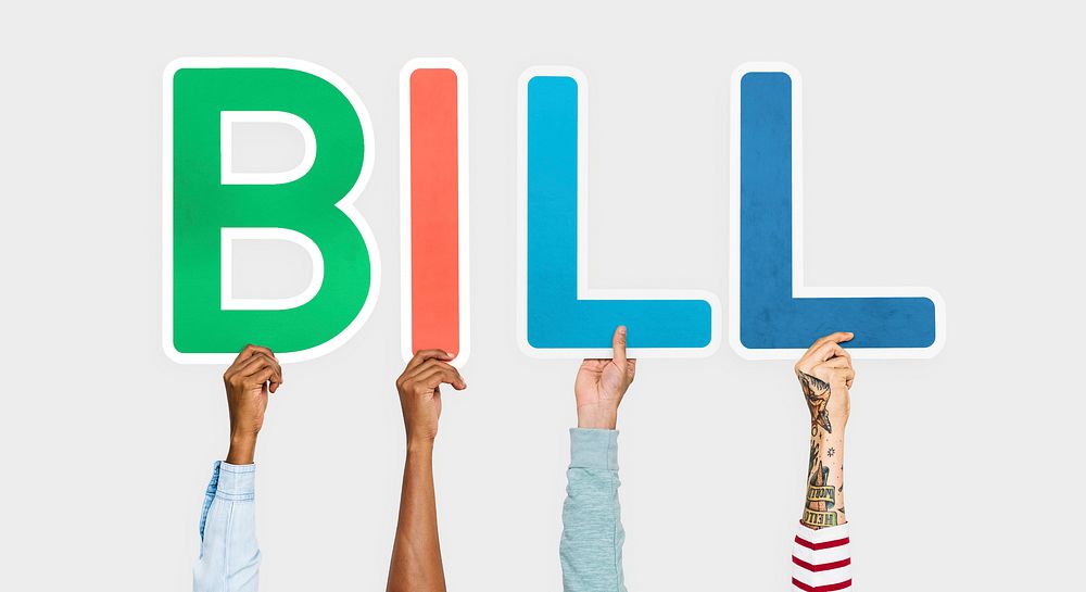 Hands holding up colorful letters forming the word bill