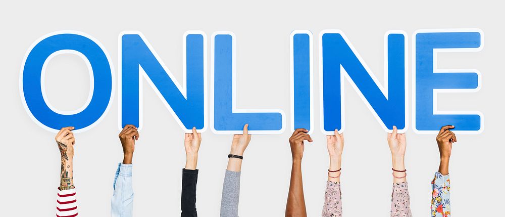 Hands holding up blue letters forming the word online