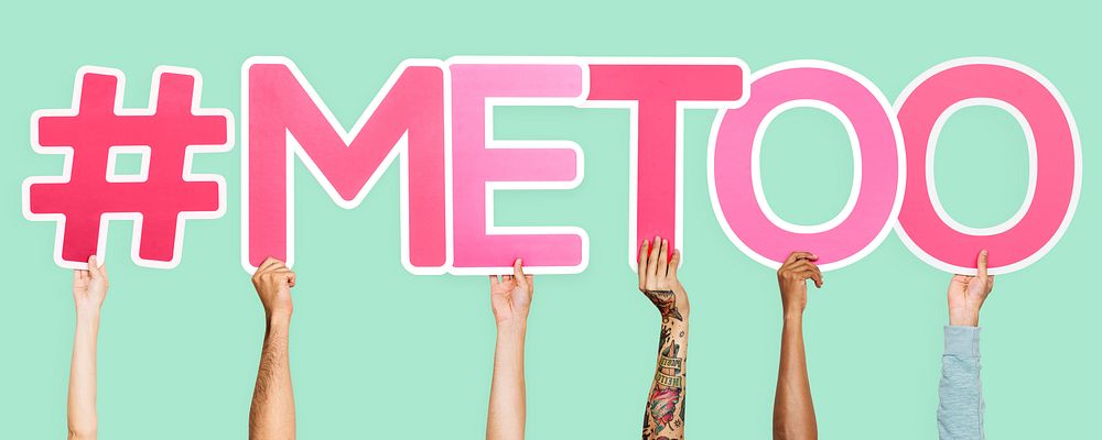 Pink letters forming the word #metoo