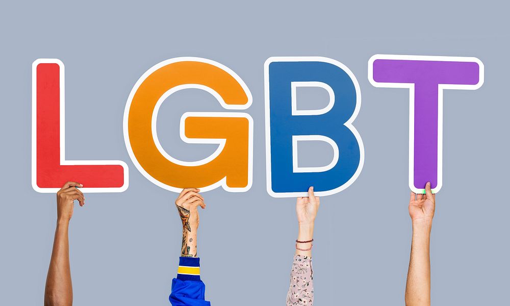 Hands holding the abbreviation LGBT