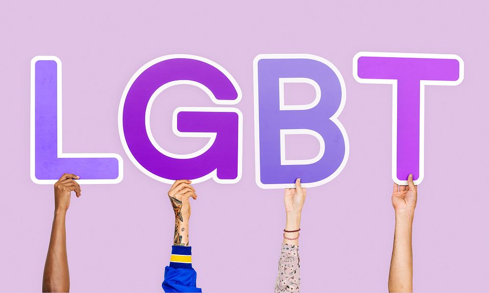 Hands holding the abbreviation LGBT