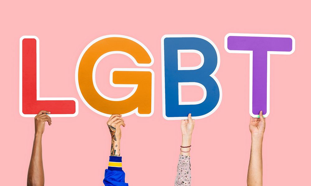 Hands holding the abbreviation LGBT