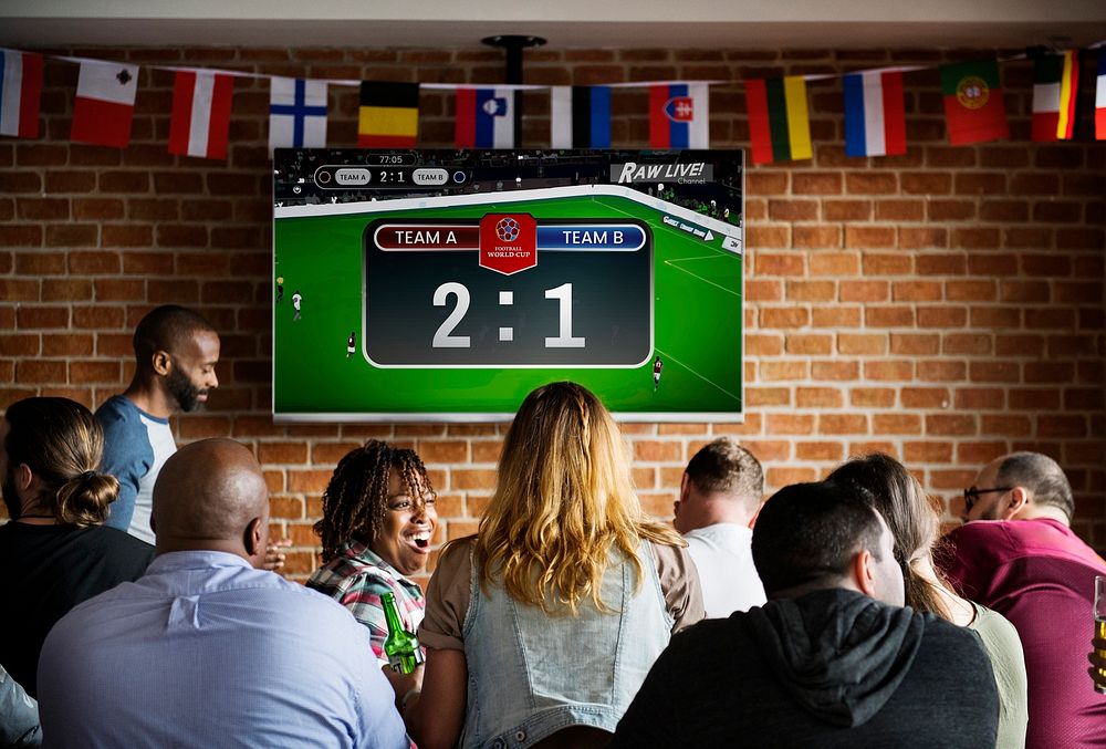 People watching football at a sports bar