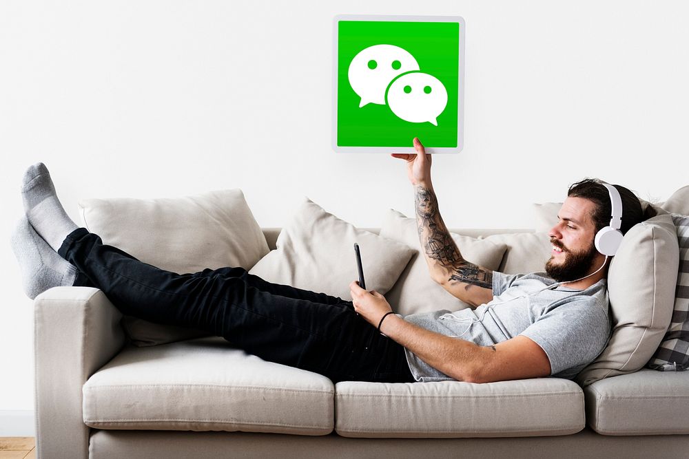 Man showing a WeChat icon