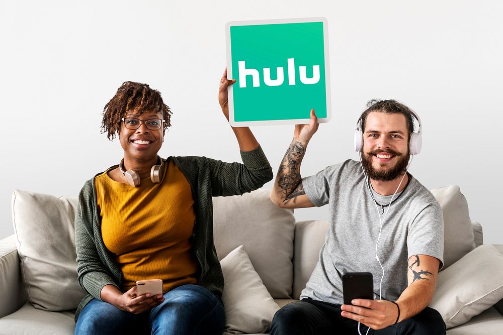 Couple showing a Hulu icon