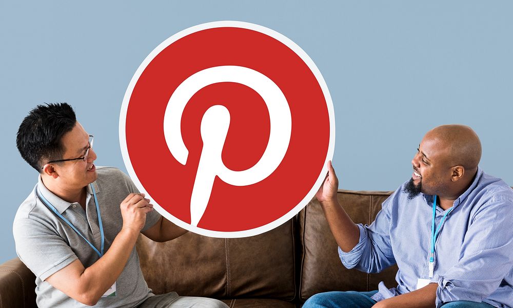 Men showing a Pinterest icon
