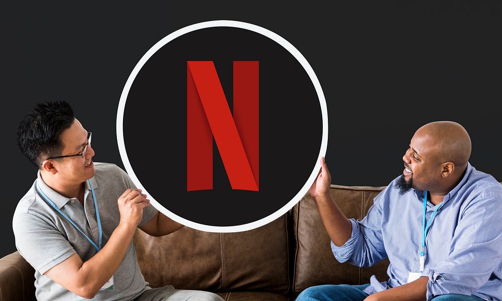 Men showing a Netflix icon