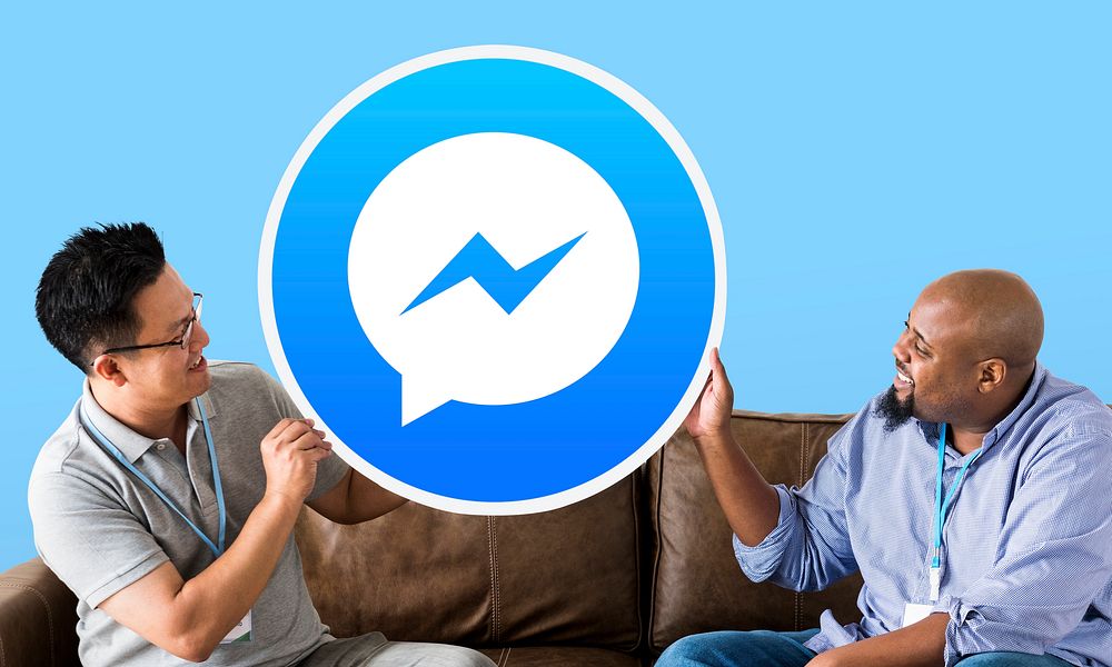 Men showing a Facebook Messenger icon