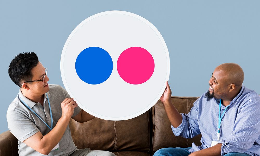 People holding a Flickr icon