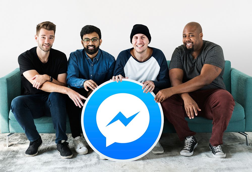 Men showing a Facebook Messenger icon