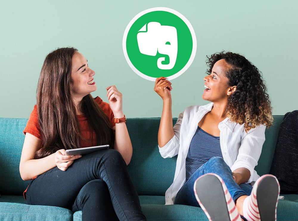 Women showing an Evernote icon