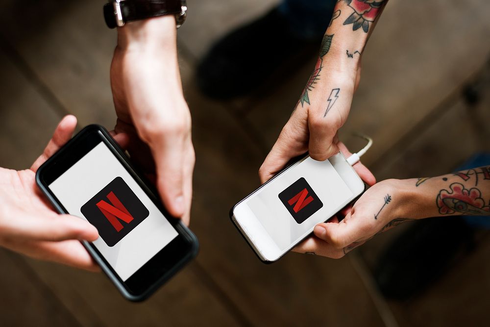 People watching Netflix on phones. BANGKOK, THAILAND, 1 NOV 2018.