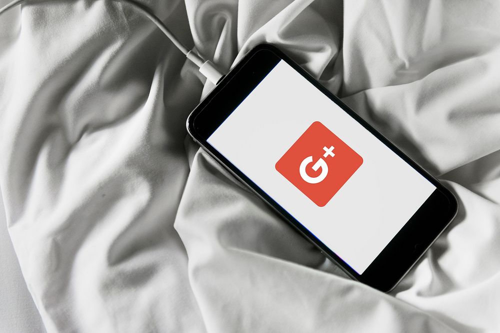Google Plus logo showing on a charging mobile phone. BANGKOK, THAILAND, 1 NOV 2018.
