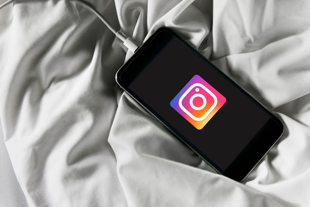 Instagram logo showing on a charging mobile phone. BANGKOK, THAILAND, 1 NOV 2018.