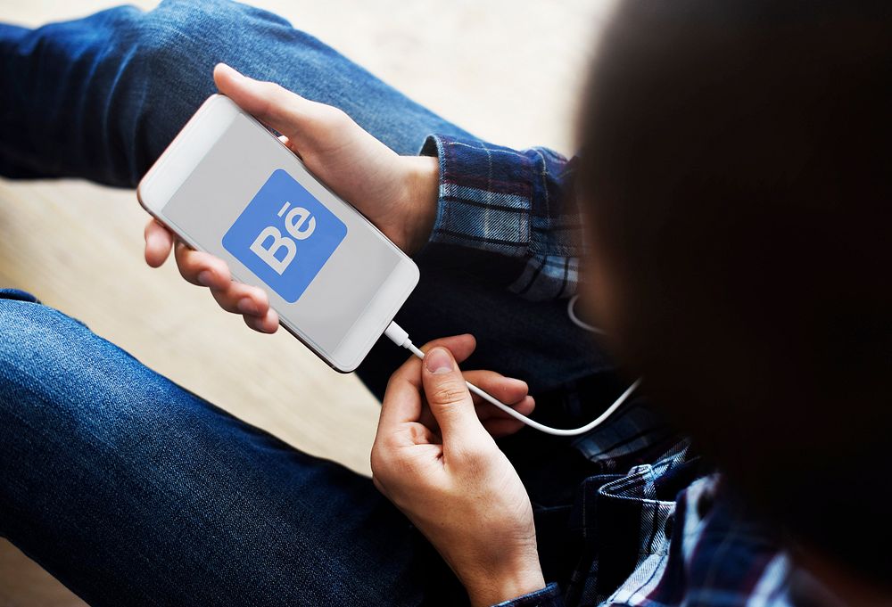 Behance logo showing on a mobile phone. BANGKOK, THAILAND, 1 NOV 2018.