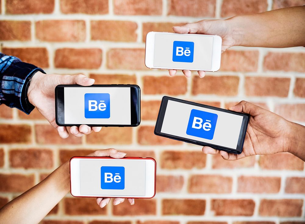 People using Behance on phones. BANGKOK, THAILAND, 1 NOV 2018.