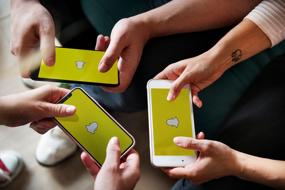 Group of people using Snapchat. BANGKOK, THAILAND, 1 NOV 2018.