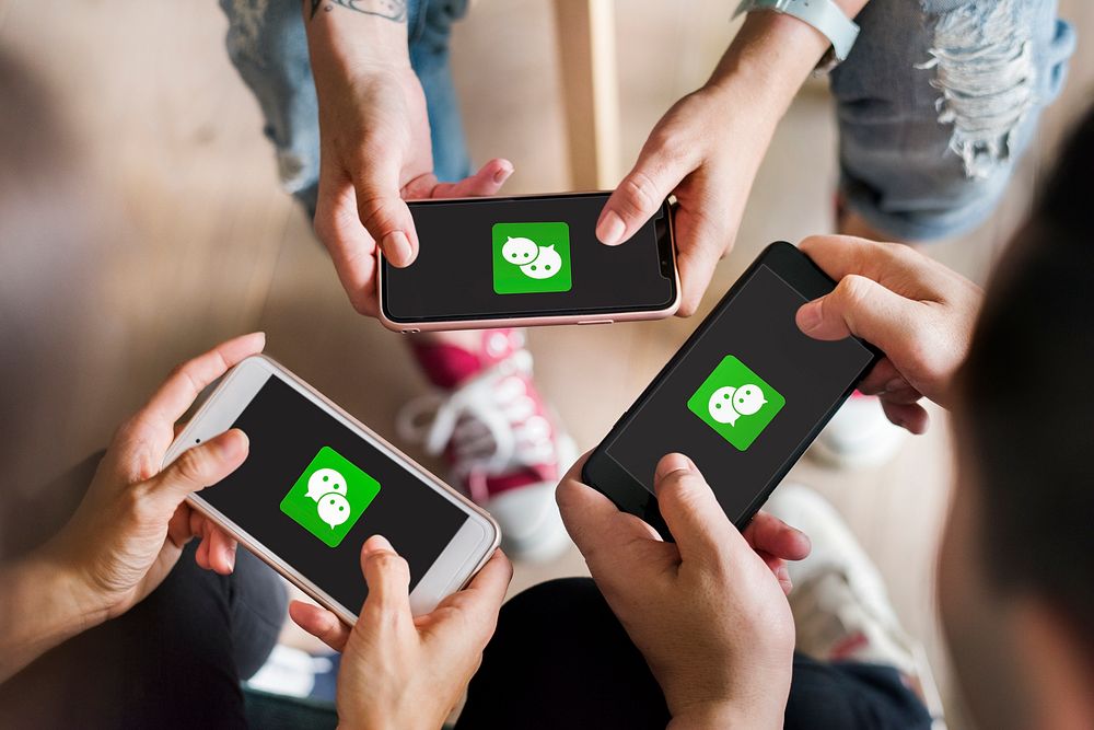 People using WeChat for communication