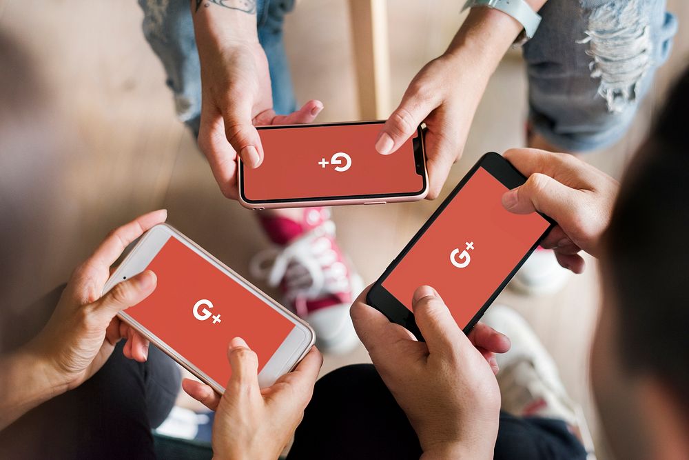 People using Google Plus applications on phones. BANGKOK, THAILAND, 1 NOV 2018.
