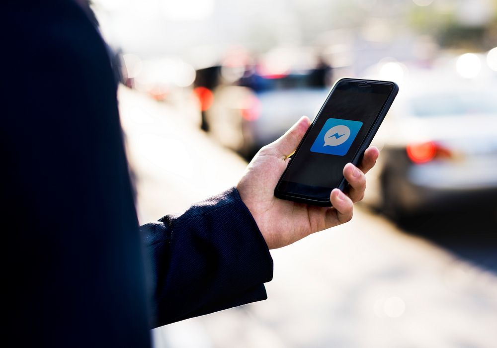 Facebook Messenger logo showing on a mobile phone. BANGKOK, THAILAND, 1 NOV 2018.