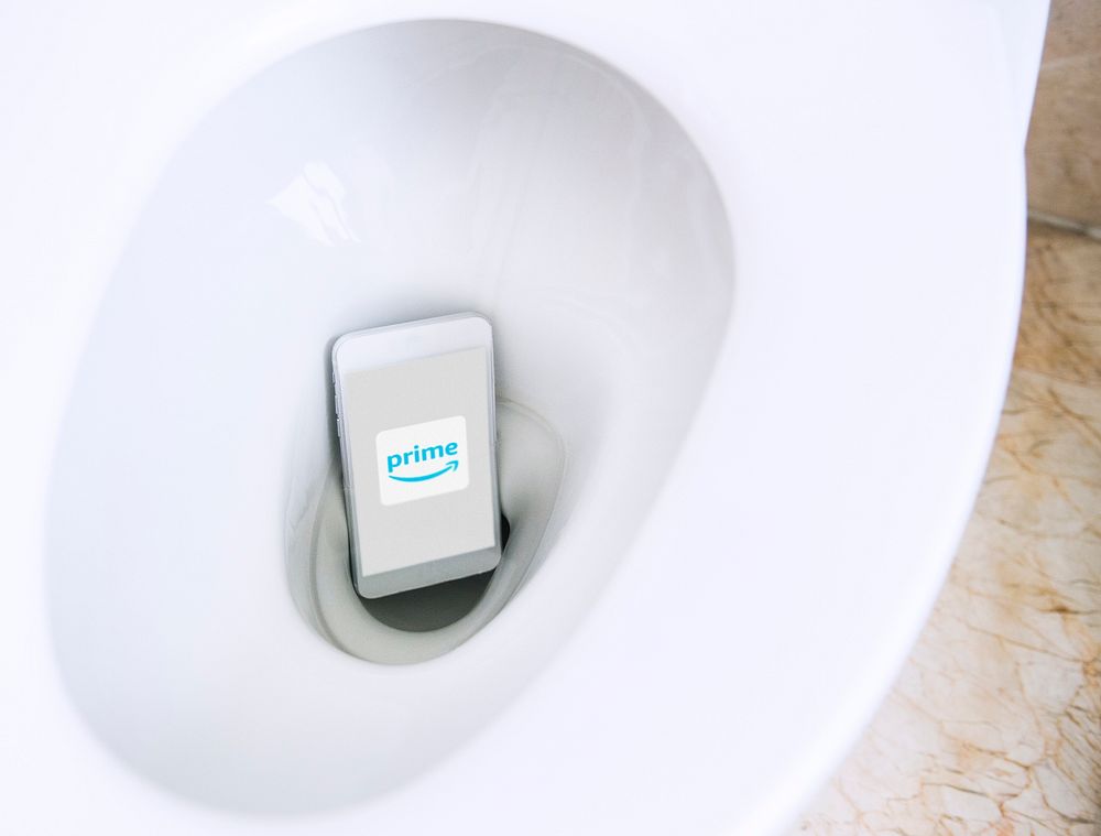 Prime Video logo showing on a phone in a toilet bowl. BANGKOK, THAILAND, 1 NOV 2018.