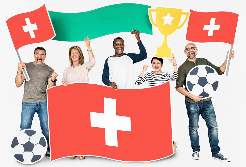 Diverse football fans holding the flag of Switzerland