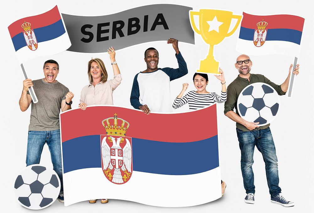 Diverse football fans holding the flag of Serbia