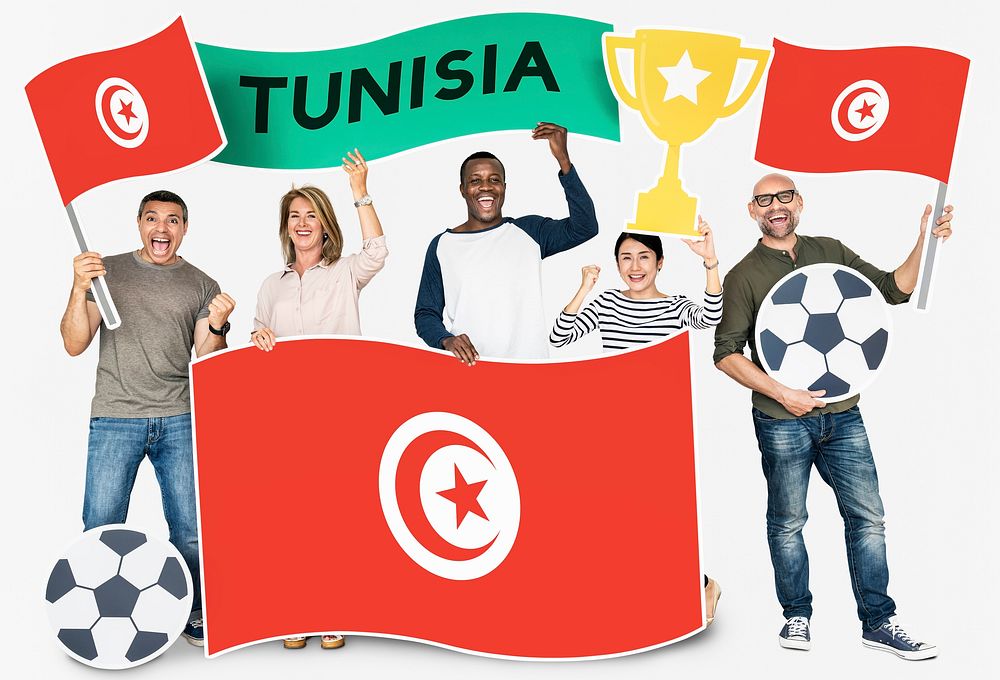 Diverse football fans holding the flag of Tunisia