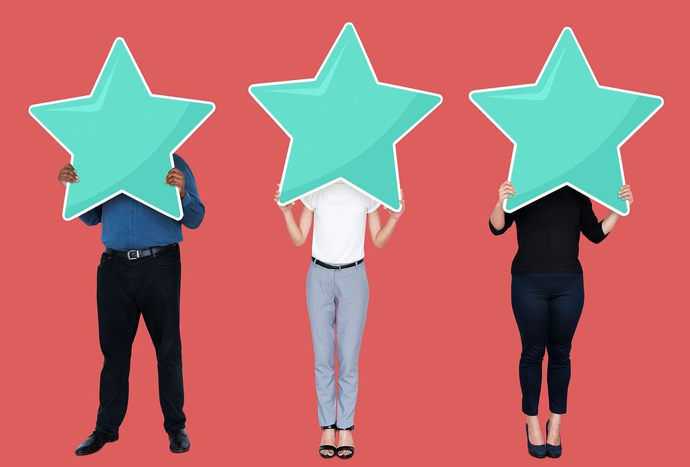 Diverse businesspeople showing a star rating symbol