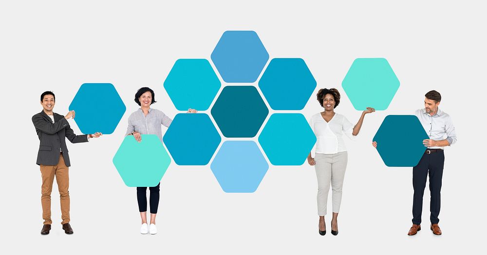 Business people with connected hexagon boards