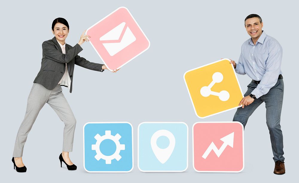 Business partners holding online icons