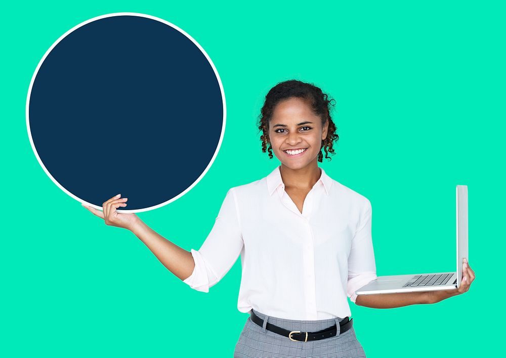 Young businesswoman holding a blank circle and a laptop