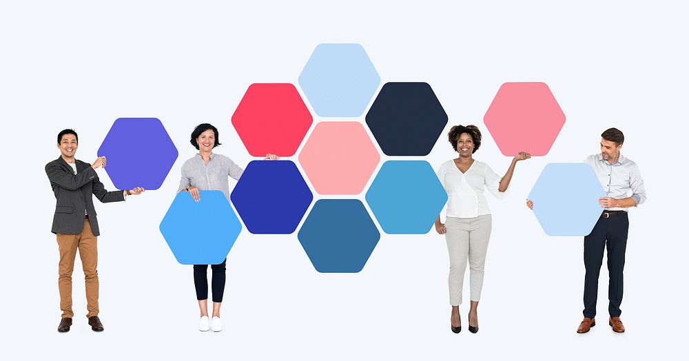 Business people with connected hexagon boards