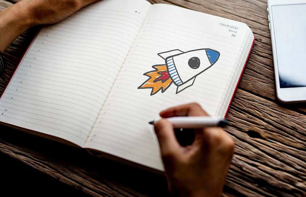 Rocket launch drawing on a notebook